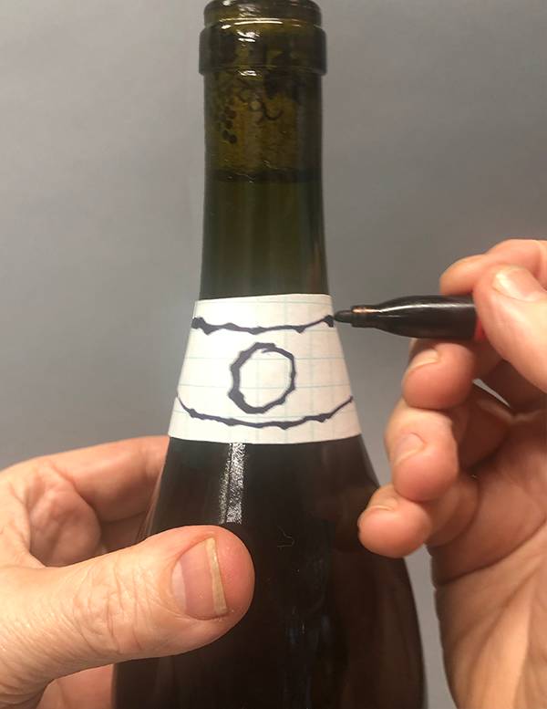 Drawing straight line by keeping pen still and turning bottle
